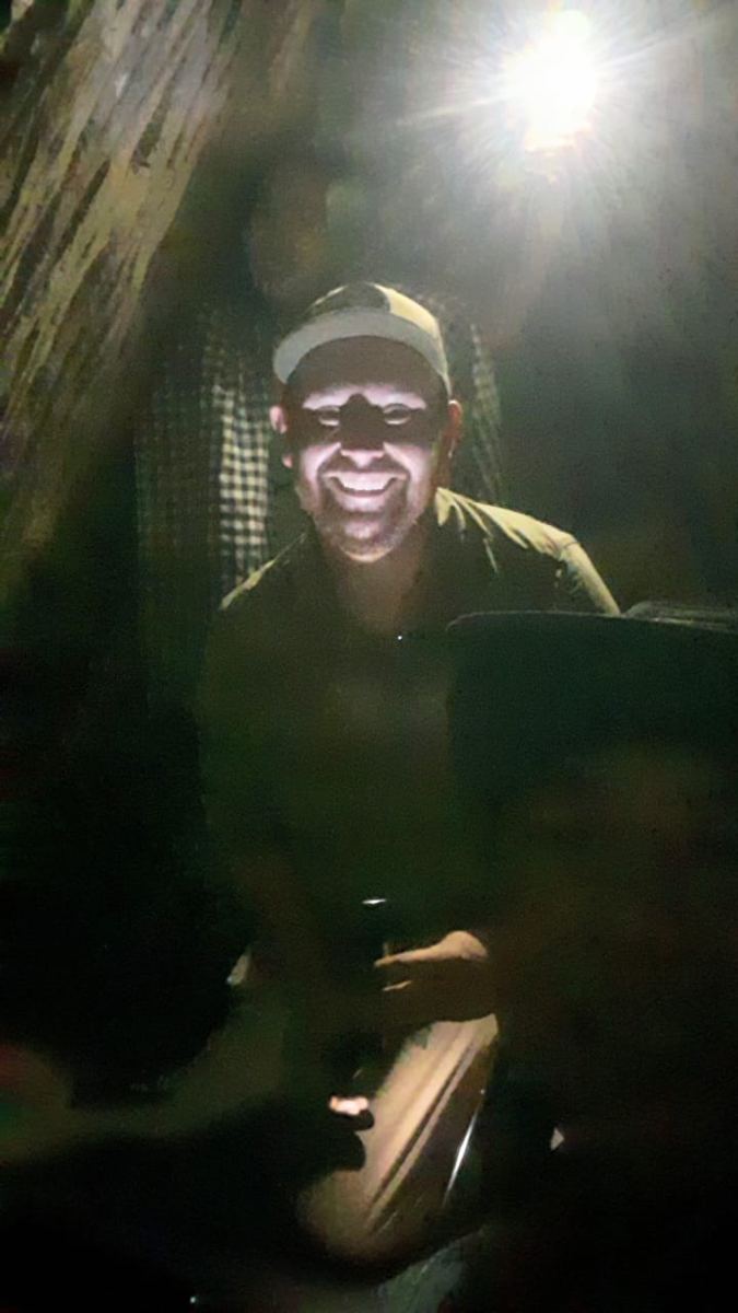 John inside one of the Cu Chi Tunnels